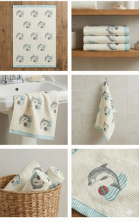 Collection of towels with dolphin designs in various settings.