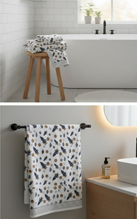 Bathroom setting with a patterned towel on a wooden stool and wall-mounted rack.